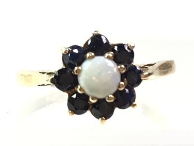 Lot 349 - OPAL AND GEMSTONE RING