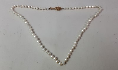 Lot 339 - TWO SINGLE STRAND PEARL NECKLACES WITH GOLD CLASPS