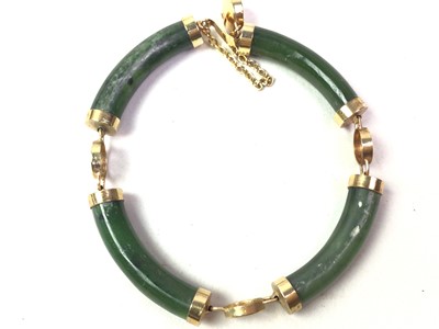 Lot 497 - CHINESE JADE AND YELLOW METAL BRACELET