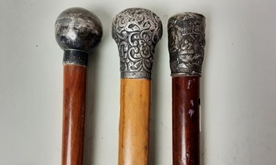 Lot 875 - GROUP OF THREE SILVER TOPPED SWAGGER STICKS