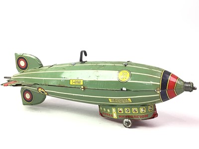 Lot 631 - THREE TINPLATE TOYS