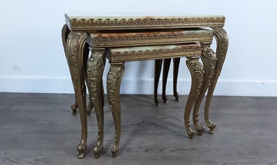 Lot 571 - NEST OF ONYX AND BRASS TABLES