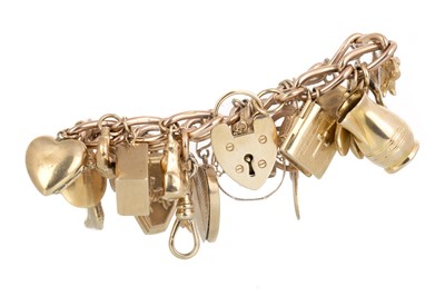 Lot 518 - GOLD CHARM BRACELET