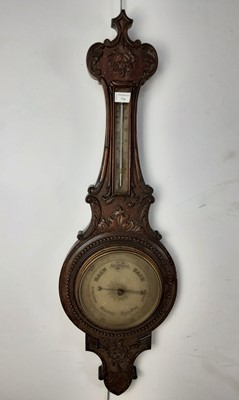 Lot 774 - LATE VICTORIAN CARVED OAK BANJO BAROMETER/THERMOMETER