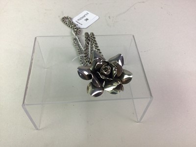 Lot 30 - SILVER FLOWER PENDANT