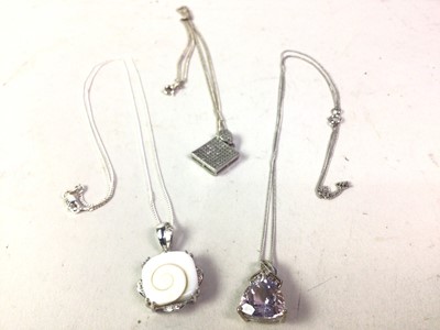 Lot 304 - EIGHT SILVER PENDANTS