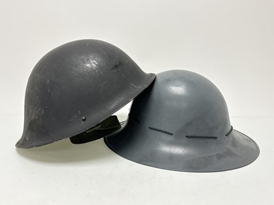 Lot 92 - TWO MILITARY HELMETS