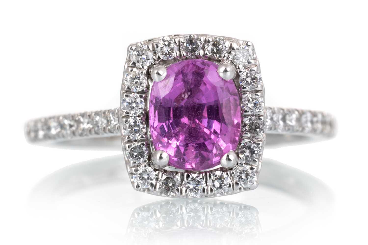 Lot 561 - PINK SAPPHIRE AND DIAMOND RING