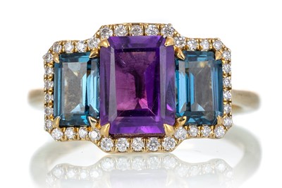 Lot 563 - AMETHYST, TOPAZ AND DIAMOND RING