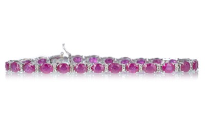 Lot 483 - RUBY AND DIAMOND BRACELET