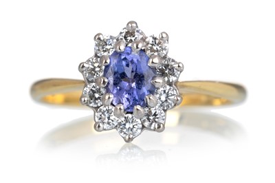 Lot 497 - TANZANITE AND DIAMOND CLUSTER RING