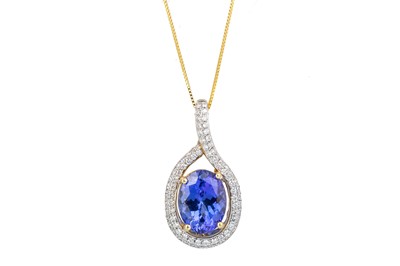 Lot 492 - TANZANITE AND DIAMOND PENDANT