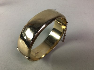 Lot 555 - GOLD BANGLE