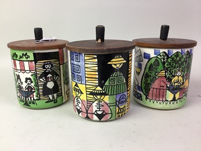 Lot 606 - SET OF THREE CERAMIC CANISTERS WITH TEAK LIDS