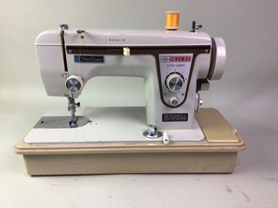 Lot 674 - NEW WORLD DELUXE ELECTRIC PORTABLE SEWING MACHINE