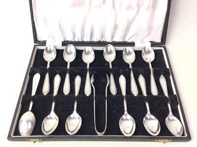 Lot 688 - GEORGE VI SET OF TWELVE SILVER TEASPOONS WITH TONGS