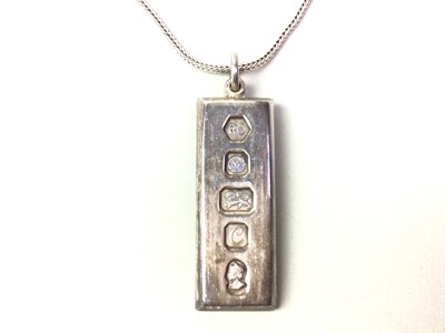 Lot 724 - SILVER INGOT PENDANT ON CHAIN