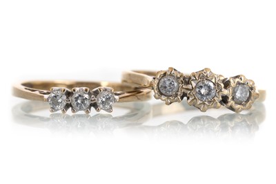 Lot 502 - TWO DIAMOND THREE STONE RINGS