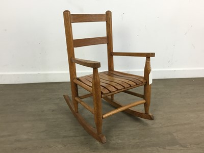 Lot 777 - CHILD'S OAK ROCKING CHAIR