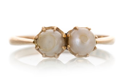 Lot 517 - PEARL TWO STONE RING