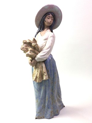 Lot 110 - NAO GRES FIGURE OF A WOMAN