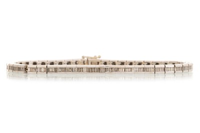 Lot 544 - DIAMOND TENNIS BRACELET