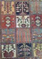 Lot 225 - LARGE 20TH CENTURY EASTERN WOOL RUG in shades...
