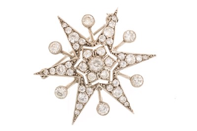 Lot 558 - WHITE SAPPHIRE STAR BROOCH