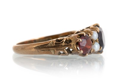 Lot 602 - GARNET AND SEED PEARL BOAT SHAPED RING