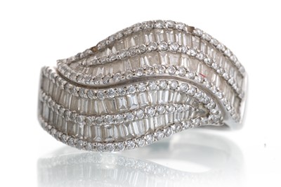 Lot 604 - DIAMOND WAVE RING