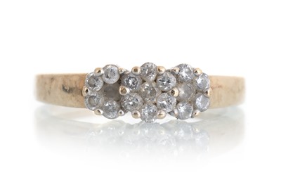 Lot 612 - DIAMOND TRIPLE DAISY CLUSTER RING