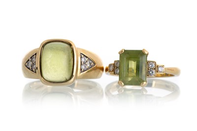 Lot 617 - TWO PERIDOT AND DIAMOND RINGS