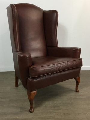 Lot 645 - LEATHER WING BACK ARMCHAIR