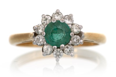 Lot 647 - EMERALD AND DIAMOND CLUSTER RING