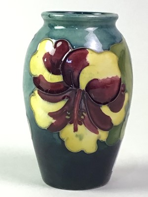 Lot 53 - THREE SMALL MOORCROFT VASES