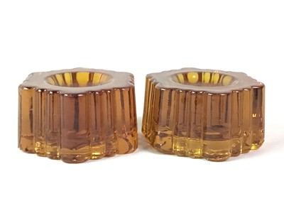 Lot 45 - SET OF VICTORIAN AMBER GLASS PIANO INSULATORS