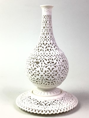 Lot 40 - BISQUE PORCELAIN RETICULATED VASE ON STAND