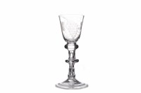 Lot 438 - GEORGE II BALUSTROID WINE GLASS with round...