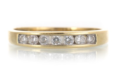 Lot 710 - DIAMOND SEVEN STONE RING