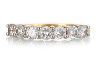 Lot 712 - DIAMOND SEVEN STONE RING