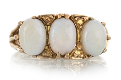 Lot 738 - OPAL THREE STONE RING