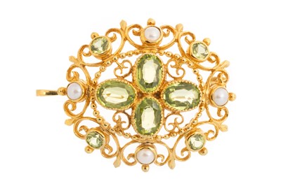 Lot PERIDOT AND PEARL BROOCH