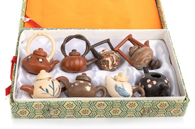 Lot 1428 - GROUP OF EIGHT CHINESE YIXING STYLE MINIATURE TEAPOTS