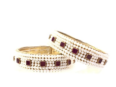 Lot 144 - TWO PEARL BANGLES