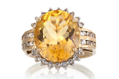 Lot 506 - CITRINE AND TOPAZ RING