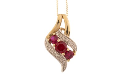 Lot 574 - RUBY AND DIAMOND PENDANT