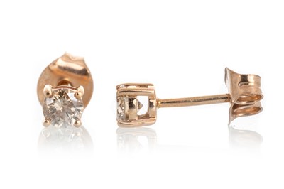 Lot 580 - PAIR OF COGNAC DIAMOND STUD EARRINGS