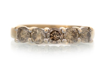 Lot 592 - COGNAC DIAMOND FIVE STONE RING