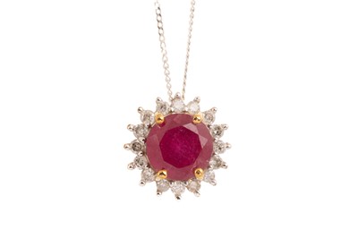 Lot 672 - RUBY AND DIAMOND CLUSTER PENDANT