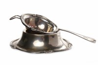 Lot 70 - PERUVIAN SILVER TEA STRAINER ON STAND the...